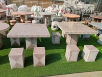 Ensemble table et chaises et banquette en pierre de roche naturelle pour jardin extérieur