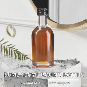 Flacon de parfum en verre rond et élancé de 50 ml et 100 ml avec bouchon à vis - Product Image 2
