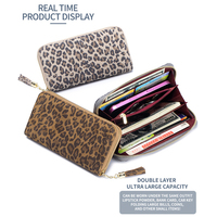 Femmes grande capacité Rfid Long portefeuille motif léopard Portable fermeture éclair porte-monnaie porte-carte glands en cuir véritable