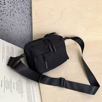 Sac bandoulière populaire en tissu nylon grande capacité pour hommes et femmes, idéal pour les trajets quotidiens, simple et décontracté