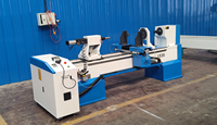 Tour à bois CNC entièrement automatique à axe unique et double lame pour la fabrication de colonnes d'escalier et de pieds de table