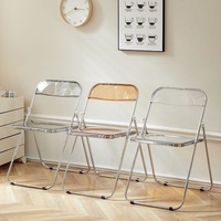 Chaise pliante à cadre métallique transparent, design moderne et épuré, chaise photo tendance pour magasins de vêtements et repas à domicile