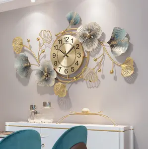 Reloj de pared con diseño de hoja de hierro forjado para sala de estar, decoración de pared, estilo europeo, dorado, de lujo, novedad