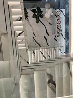 Décoration murale et de sol intérieure en quartz artificiel, type moderne, dalle de porcelaine en pierre frittée, marches en pierre rétroéclairées Panda White