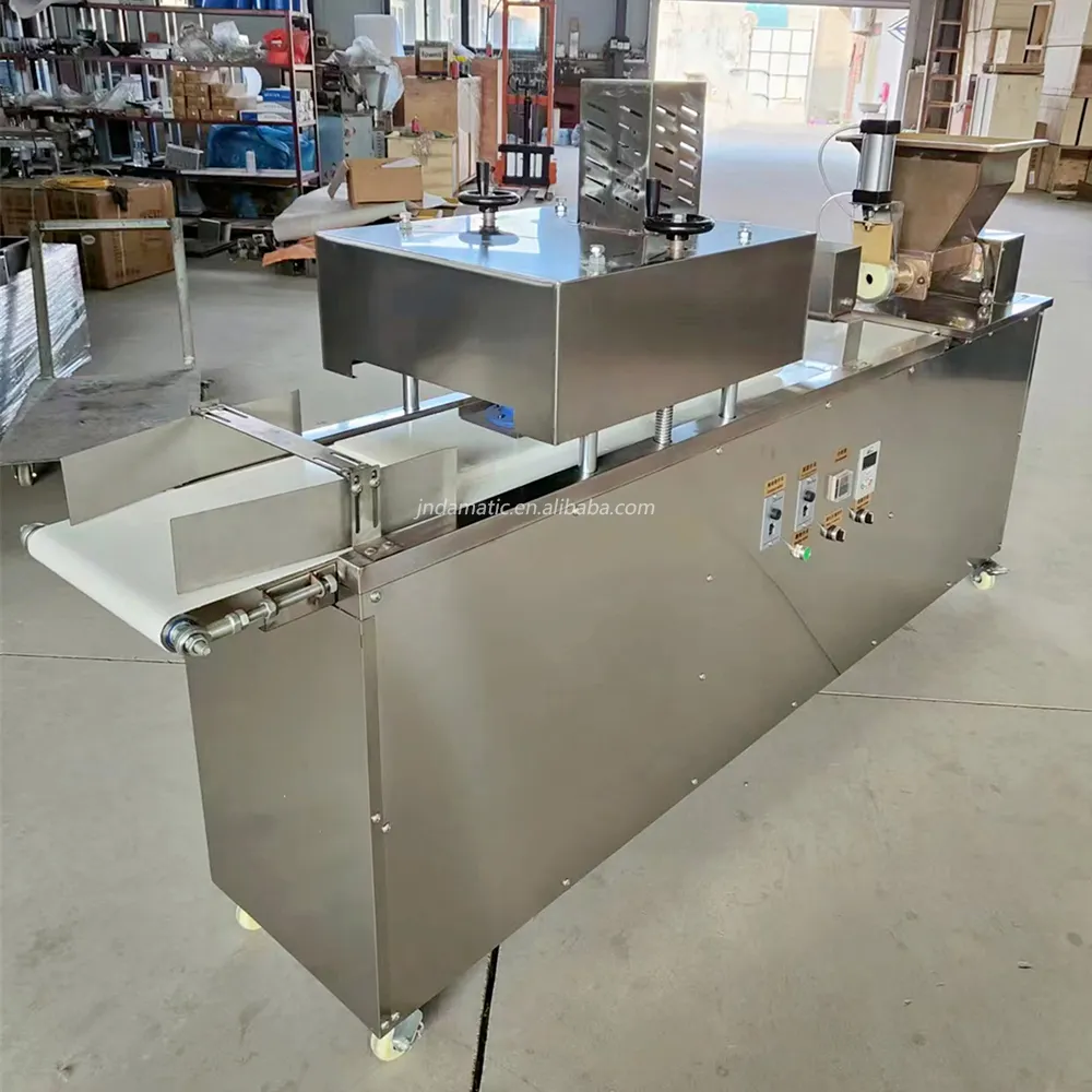 Commercial dough rounder and divider machine for making dough balls