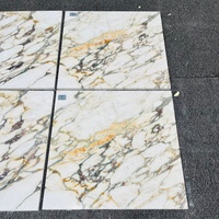 Marbre Calacatta Viola naturel PerfectStone avec veines jaunes pour la décoration intérieure haut de gamme