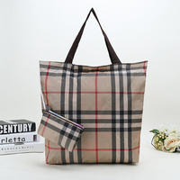 Sac fourre-tout en nylon Oxford avec logo personnalisé résistant à l'eau et recyclable avec fermeture éclair pliable en polyester recyclé