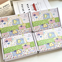 Boîte d'expédition mignonne en forme d'avion avec éléphant bleu de dessin animé et imprimé animal vert pastel pour cartes photo, petits cadeaux pour enfants et emballage d'expédition