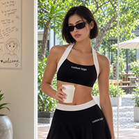 Ensemble 2 pièces pour femme : Soutien-gorge de sport à col halter et jupe-short de golf athlétique, tenue de sport color block pour la gym et l'entraînement