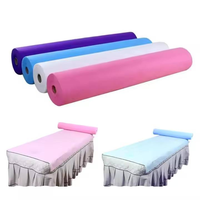 Le salon de beauté utilise des draps de lit et des rouleaux de canapé jetables en papier d'examen médical PP + PE 35 g/m² de 60 * 45 cm.
