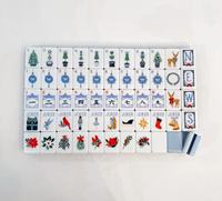 Ensemble de Mahjong de Noël en Acrylique Bleu Clair 160 Tuiles – Jeu Festif de Designer avec Motifs Renne et Casse-Noisette – Coffret Cadeau de Luxe