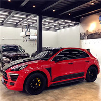 Nouveau remplacement pour le kit carrosserie en fibre de carbone Macan avec ailerons larges et diffuseur arrière pour voiture de sport (Chine)