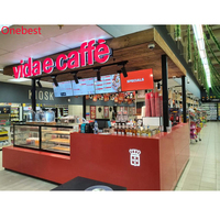 Comptoir de bar rétroéclairé avec logo en forme de U en pierre de quartz Corian rouge de Chine pour kiosque de fruits