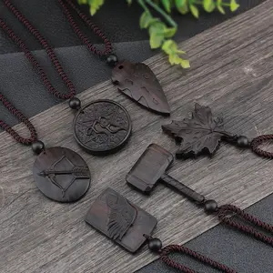 Style ethnique personnalisé Blackwood pendentif collier sculpture à la main longue chaîne de chandail feuille plume collier pour femmes hommes