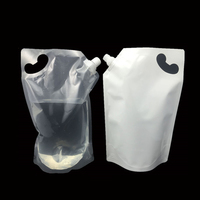 Pochette à bec biseauté pour emballage de liquide à boire debout blanche transparente en plastique personnalisée pochette à bec verseur pour boisson jus de fruits lait café
