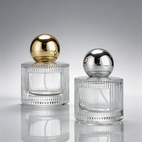Vente en gros de flacons de parfum et de cosmétiques en verre cylindrique au design unique, 40 ml, avec pulvérisateur à pompe et décalcomanie à chaud