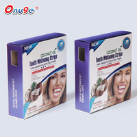 Venta al por mayor personalizado 0,1-10% peróxido transparente 14x 5d aceite de coco Kit de tiras para blanquear los dientes profesional avanzado