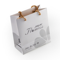 Sacs en papier noir de luxe pour bijoux, avec poignée, personnalisés avec logo de marque, pour la promotion, la vente au détail de vêtements, les cadeaux et le shopping, en gros
