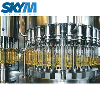 Haute vitesse entièrement automatique Monobloc Piston Pet petite bouteille tournesol moutarde sésame noix de coco huile comestible Machine de remplissage