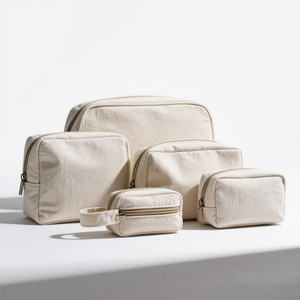 Sacchetto personalizzato OEM borsa per il <span class=keywords><strong>trucco</strong></span> di bellezza chiusura con cerniera da viaggio borsa professionale in tela per cosmetici nera con ricamo Logo - Product Image 1