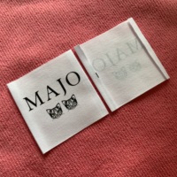 Écusson confortable d'habillement de coton blanc de blanchiment, étiquette de coton organique de logo de marque déposée pour la robe