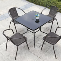 Ensemble table et chaises pliantes modernes en verre pour l'extérieur Mobilier durable en fer et corde pour jardin ou patio pour hôtels et appartements