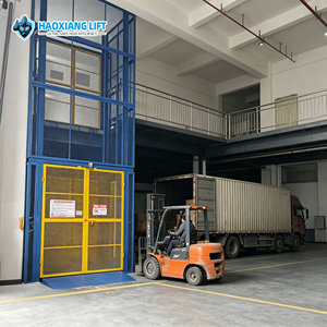 <span class=keywords><strong>Monte</strong></span>-<span class=keywords><strong>charge</strong></span> hydraulique à rail de guidage avec hauteur de levage de 6 m, capacité de 2000 kg à 5000 kg, élévateur vertical de marchandises pour entrepôt avec <span class=keywords><strong>cage</strong></span> de sécurité - Product Image 4