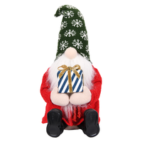 Bonnet en tricot flocon de neige vert, poupée gnome de Noël en peluche assise avec boîte cadeau pour décoration de table de fêtes, vente en gros