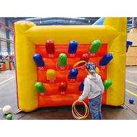 Combo de jeu sportif gonflable commercial 4-en-1 : jeu de carnaval avec défis de basketball, de football et de lancer d'anneaux pour événements en plein air