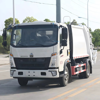 Nouveau camion compacteur de déchets léger Howo 6 m³ à chargement arrière