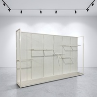 Vitrine de présentation de vêtements sur mesure avec rangement, en bois et acier inoxydable, pour la vente au détail