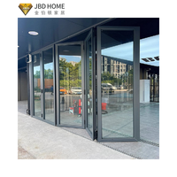 Porte pliante en verre en alliage d'aluminium - Design moderne à double battant pour villa, patio et espaces de vie intérieurs-extérieurs