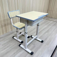 Bureau et chaise d'école réglables avec plateau facile à nettoyer et structure thermolaquée pour les élèves