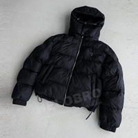 Vente en gros de manteau bombardier noir en duvet avec patchs brodés pour hommes veste bouffante d'hiver avec capuche