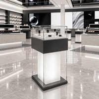 Vitrine de présentation cosmétique personnalisée, ensemble complet avec comptoirs îlots et armoires murales à LED pour magasin de beauté moderne noir et blanc