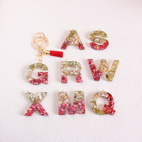 Porte-clés scintillant à 26 lettres avec accents frangés, pendentif en résine en forme de goutte, tendance