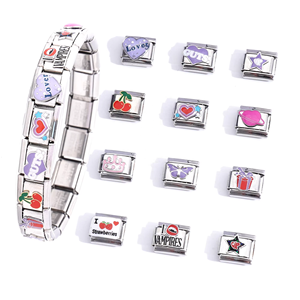 สร้อยข้อมือชาร์ม LA ชุบทอง 18k PVD  สแตนเลสอิตาลี สีชมพู  พร้อมจี้รูปหัวใจ  สร้อยข้อมือชาร์มอิตาลีพร้อมจี้รูปตัวอักษร - Product Image 1