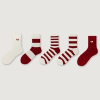 Chaussettes mi-mollet pour femmes en gros, chaussettes rayées d'automne et d'hiver, chaussettes en coton à nœuds