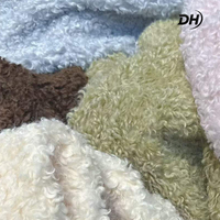 Tissu en peluche bouclé 100 % polyester, personnalisé, grand stock, moelleux et chaud, pour la production de vêtements d'hiver