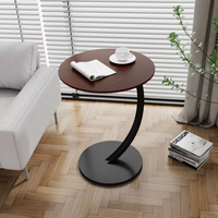 Mini table d'appoint ronde simple avec quelques coins pour les petites tables de café de salon et d'appartement à manger à la maison