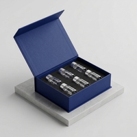 Boîte magnétique personnalisée pour l'emballage de flacons de parfum, boîte en papier de style livre à rabat de luxe avec logo UV spot