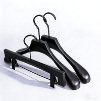 Cintre en plastique noir brillant avec pinces antidérapantes et anti-plis pour pantalons/jupes/chemises – Idéal pour l'affichage en boutique
