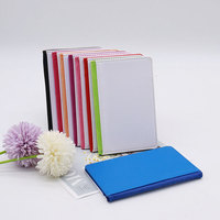 Fabriqué en usine plaine mignon PU cuir passeport couverture Sublimation Airtag passeport titulaire pour carte de visite Style de mode