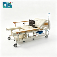 Lit médicalisé manuel 5 fonctions pour clinique et hôpital, avec barrières latérales pliantes pratiques et silencieuses, et roulettes séparables