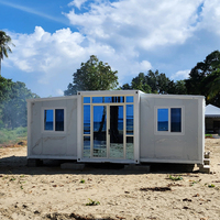 Villa préfabriquée de luxe à double aile extensible, en conteneur, avec structure en acier, panneaux de bardage étanches, climatisation personnalisée pour hôtel et appartement