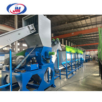 Ligne de lavage et de recyclage de films plastiques PE PP HDPE 300-2000 kg/h avec laveuse à friction, machine de lavage à chaud et d'essorage