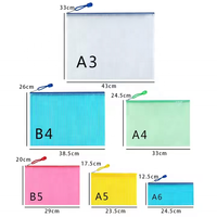 Vente en gros de sacs à fermeture éclair en filet pour organiser des sacs à documents étanches pochettes de fournitures scolaires de nombreuses couleurs en stock