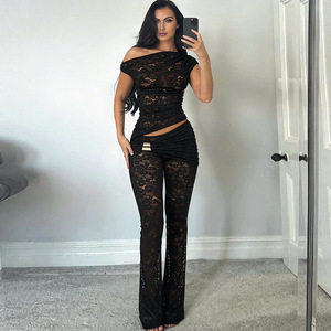 XH1215-2026 Set Primaverile Sexy con <span class=keywords><strong>Top</strong></span> <span class=keywords><strong>Asimmetrico</strong></span> a Spalle Scoperte e Pantaloni a Vita Alta Svasati - Product Image 1
