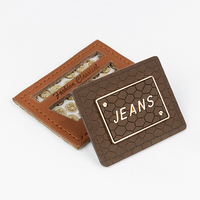 Marque Jeans Pu Étiquette Patch En Relief Logo Personnalisé Étiquettes En Cuir Vêtement Vêtements Métal Pu Cuir logo Étiquettes Pu Étiquette En Cuir