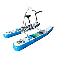 Vélo aquatique à pédales pour enfants, style SUP, ponton flottant plat, cadre en aluminium, résistant à l'usure, rangement facile, vente en gros depuis la Chine Lumark
